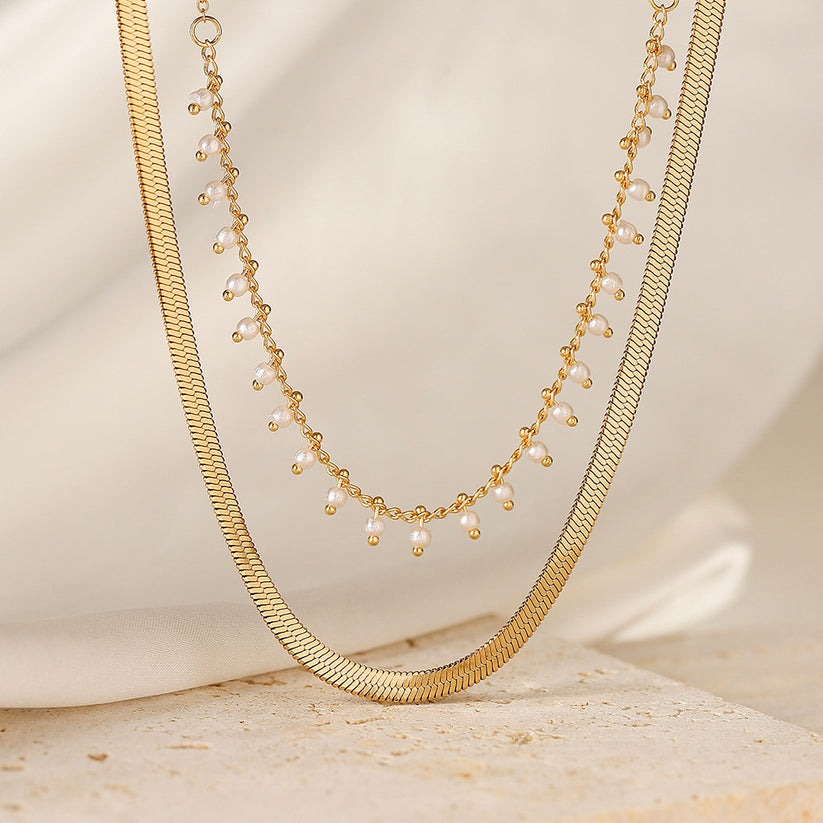 Clara | Luxuriöses Schlangen-Halsband und Perlen-Schmuckset 18 Karat Gold