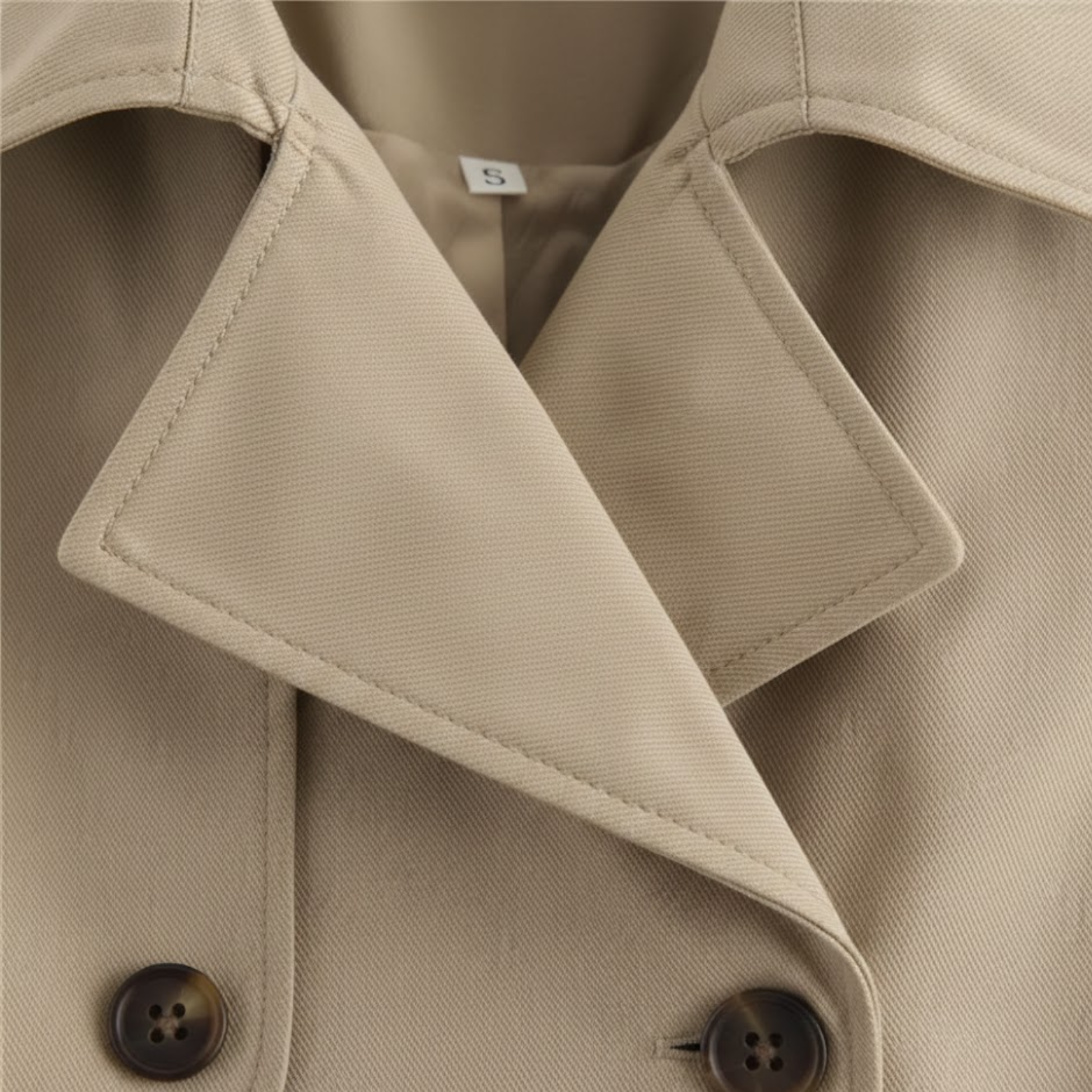 Trench-coat court pour femme à double boutonnage et col à revers cranté