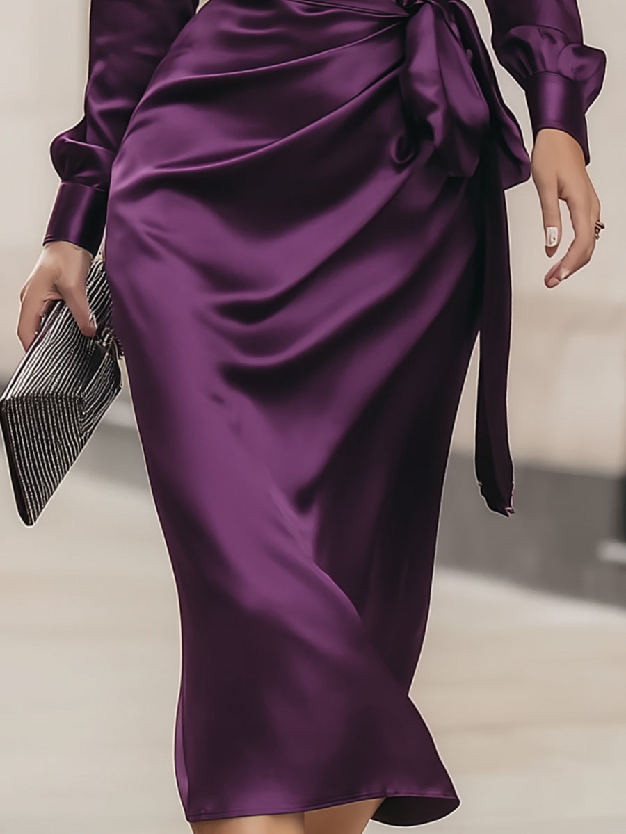Clara | Vestido midi envolvente de satén en ciruela profunda