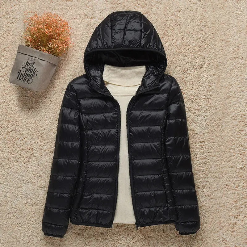 Chaqueta acolchada de plumón para mujer con capucha