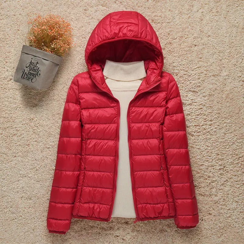 Chaqueta acolchada de plumón para mujer con capucha